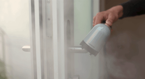IZZI disinfects a door handle